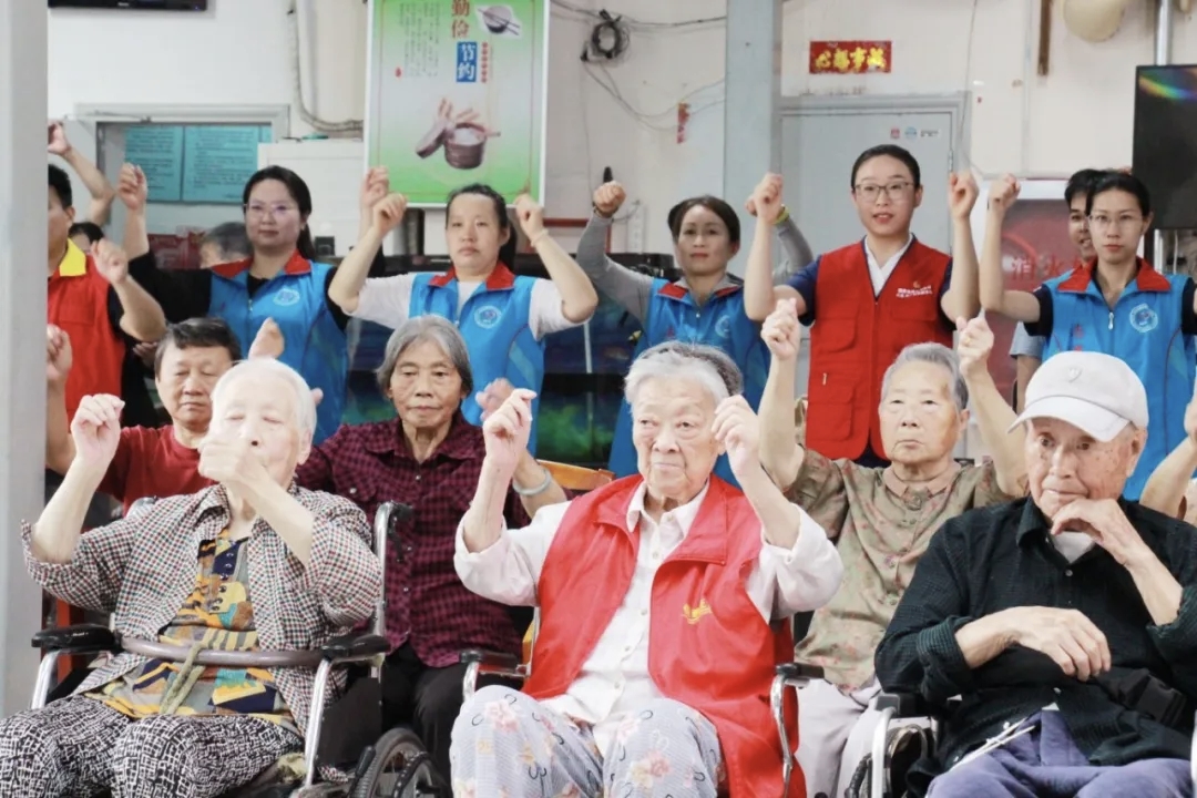 Volunteers spending time with elderly residents